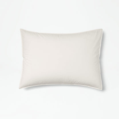 The Tuft and Needle Percale Duvet Cover Set on a mattress in a bedroom||color:sand