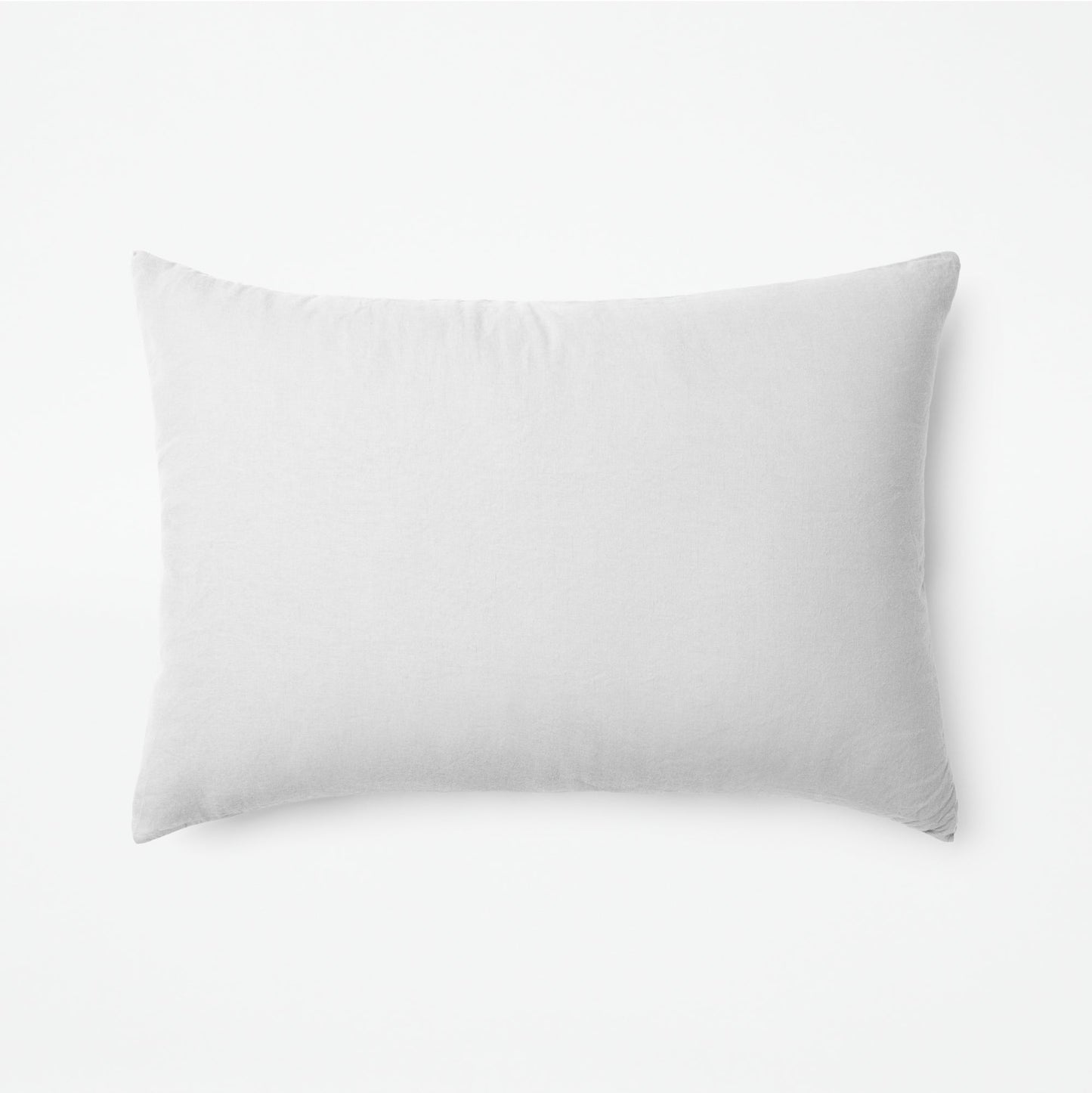 The Tuft and Needle Linen-Cotton Blend Duvet Set, one pillow laying horizontally || color: Cloud
