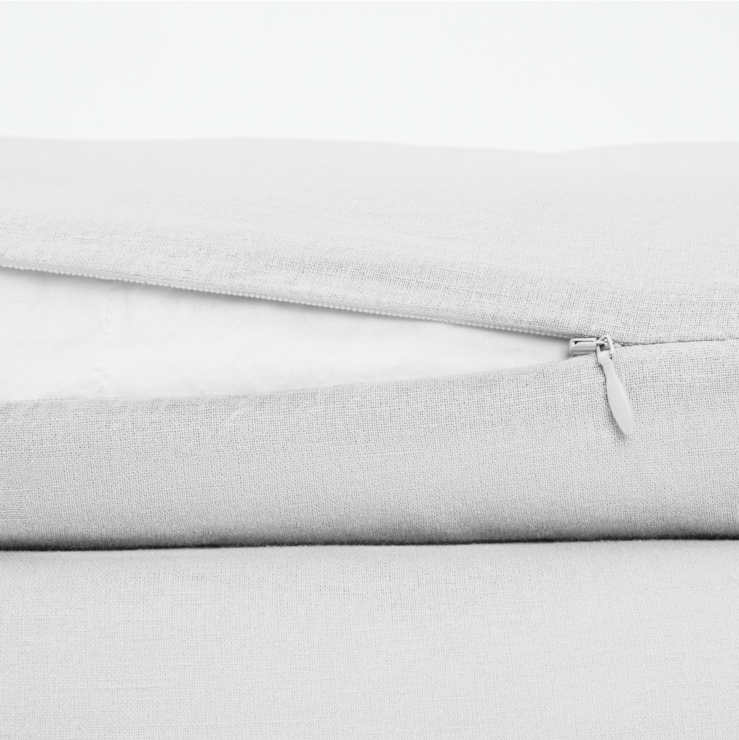The Tuft and Needle Linen-Cotton Blend Duvet Set, zipper closure on the side of the pillow || color: Cloud

