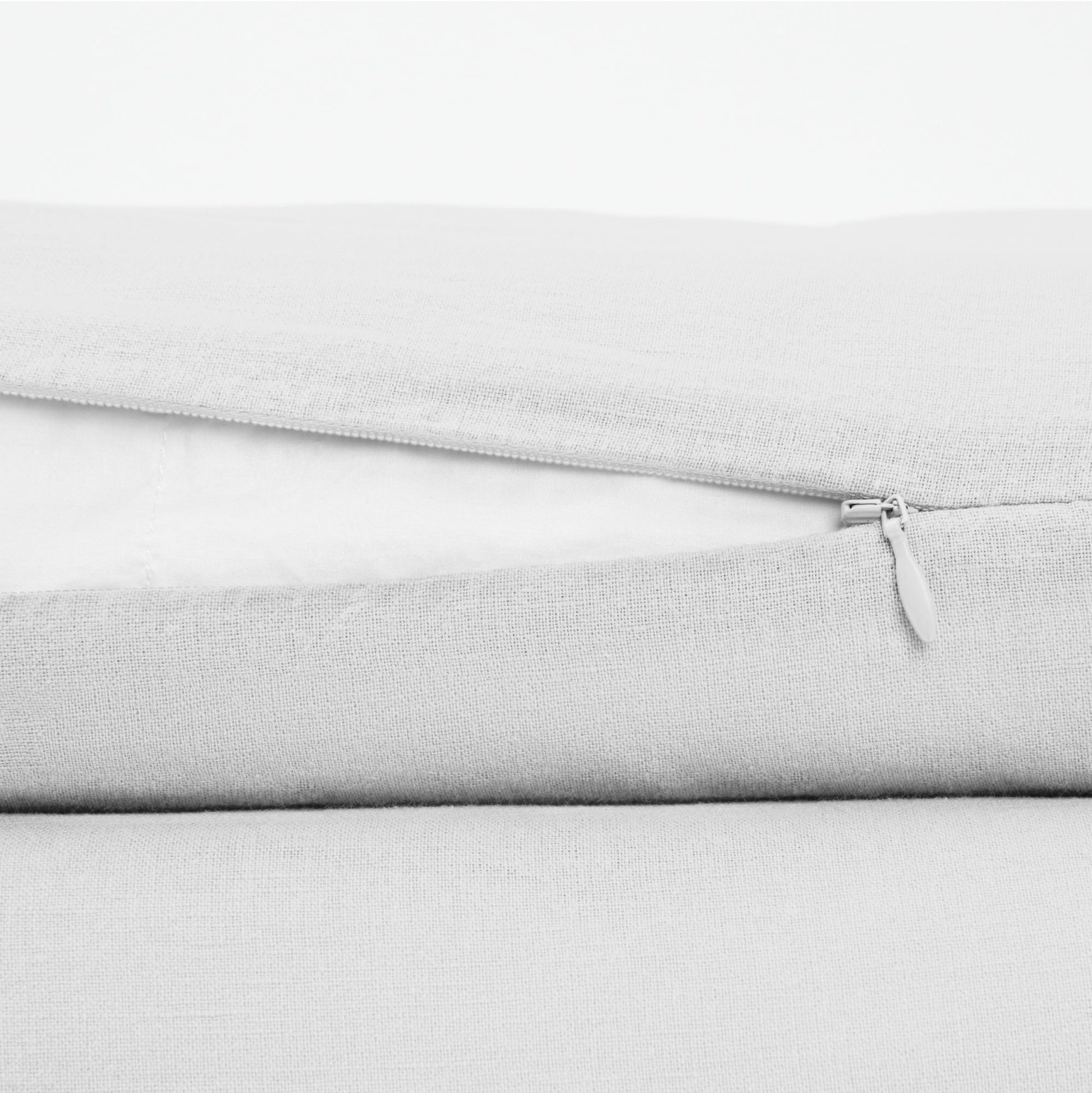 The Tuft and Needle Linen-Cotton Blend Duvet Set, zipper closure on the side of the pillow || color: Cloud

