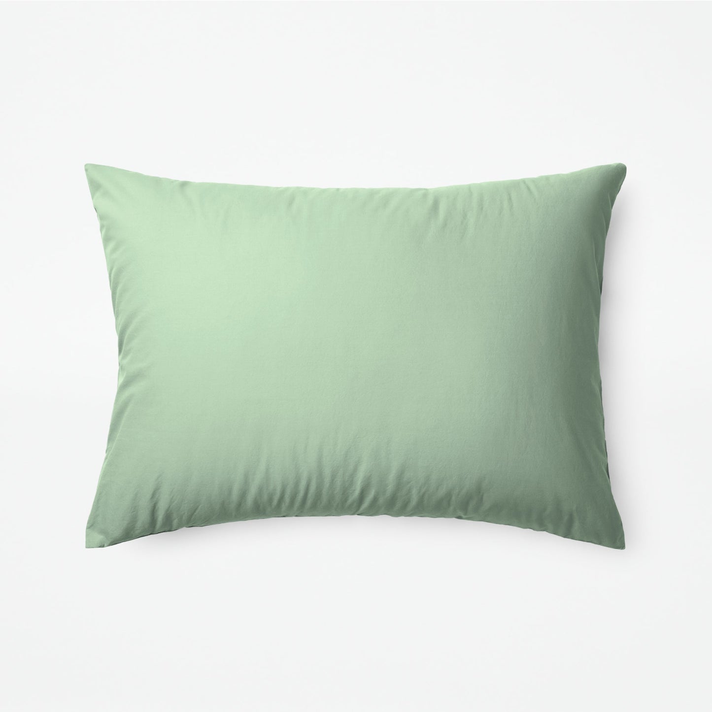 The Tuft and Needle Classic Percale Sheet Set, one pillow laying horizontally || color: Sage
