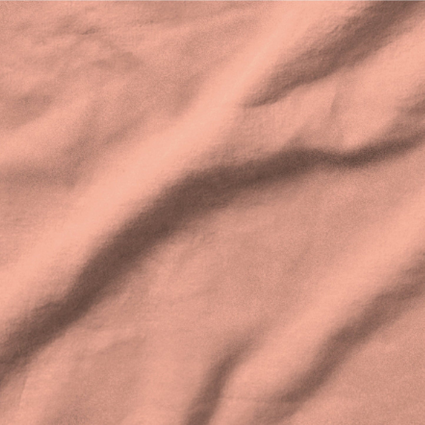 The Tuft and Needle Linen-Cotton Blend Sheet Set, one sheet spread out || color: Muted Clay

