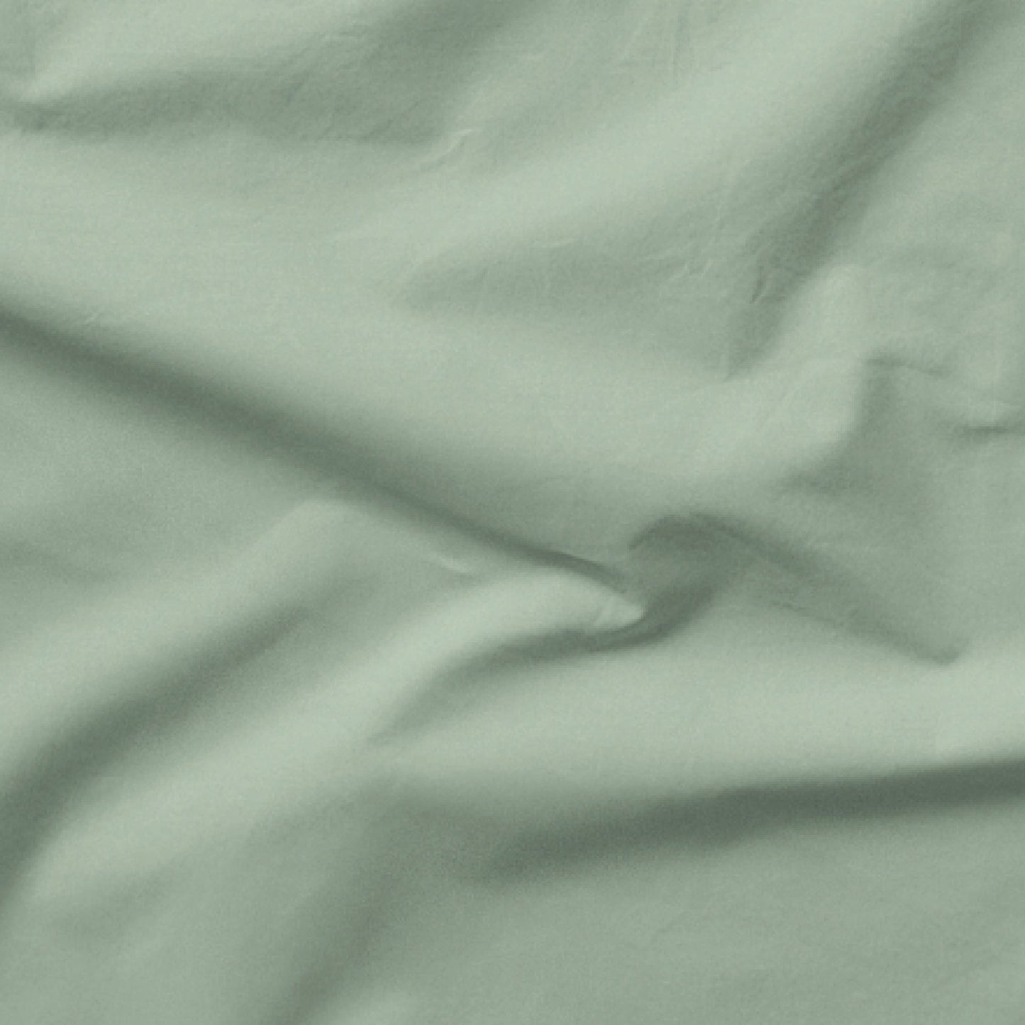 The Tuft and Needle Classic Percale Sheet Set, one sheet spread out || color: Sage