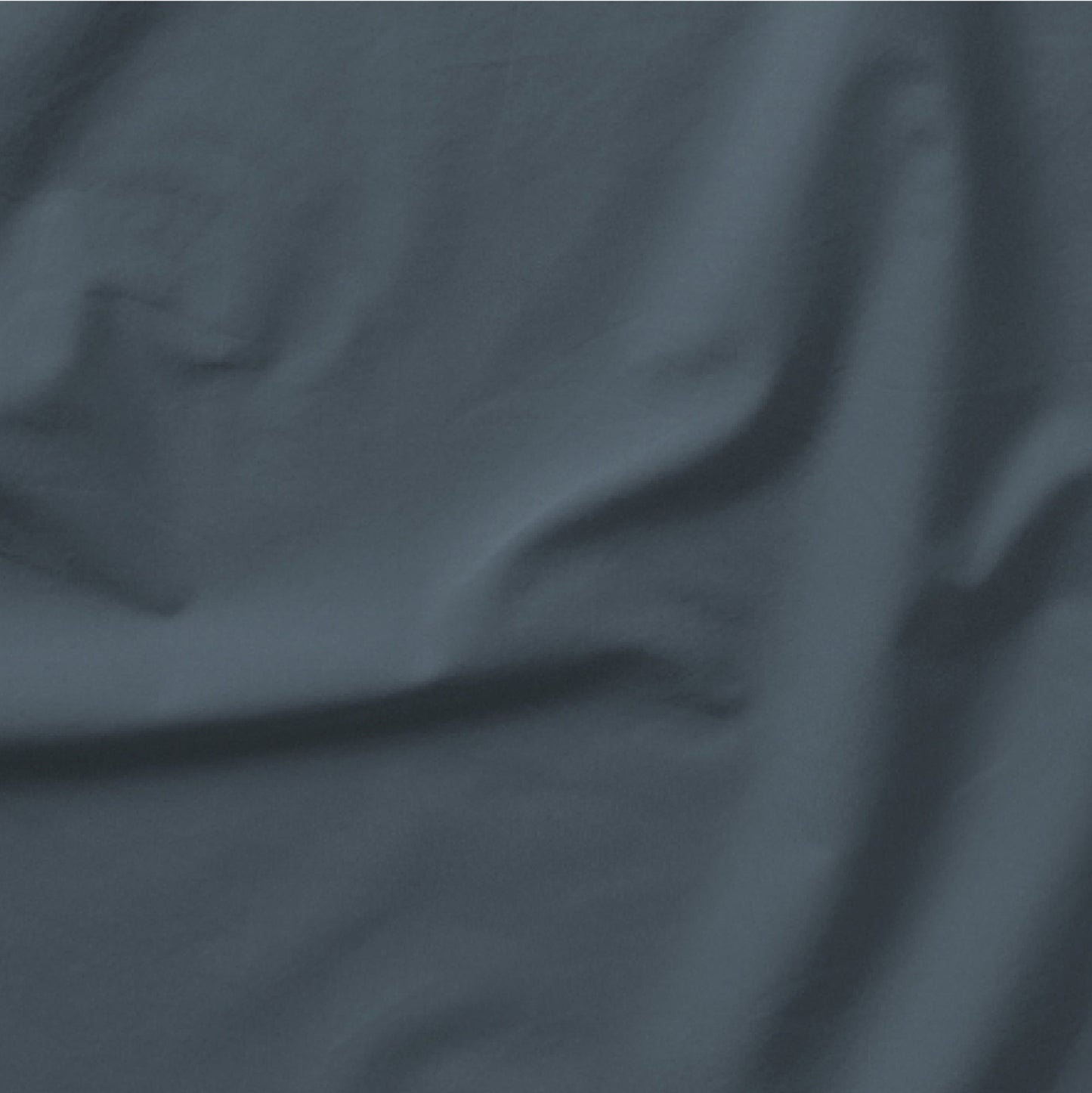 The Tuft and Needle Classic Percale Sheet Set, one sheet spread out || color: Slate
