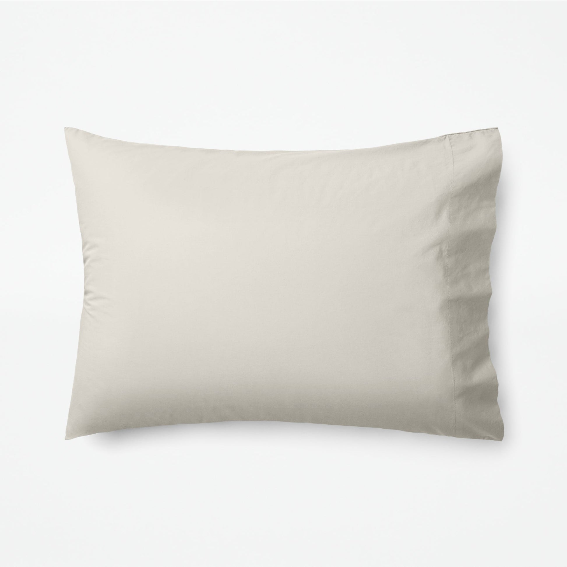 The Tuft and Needle Classic Percale Pillowcase Set, 1 pillow in a pillowcase showing in a horizontal position || color: Sand
