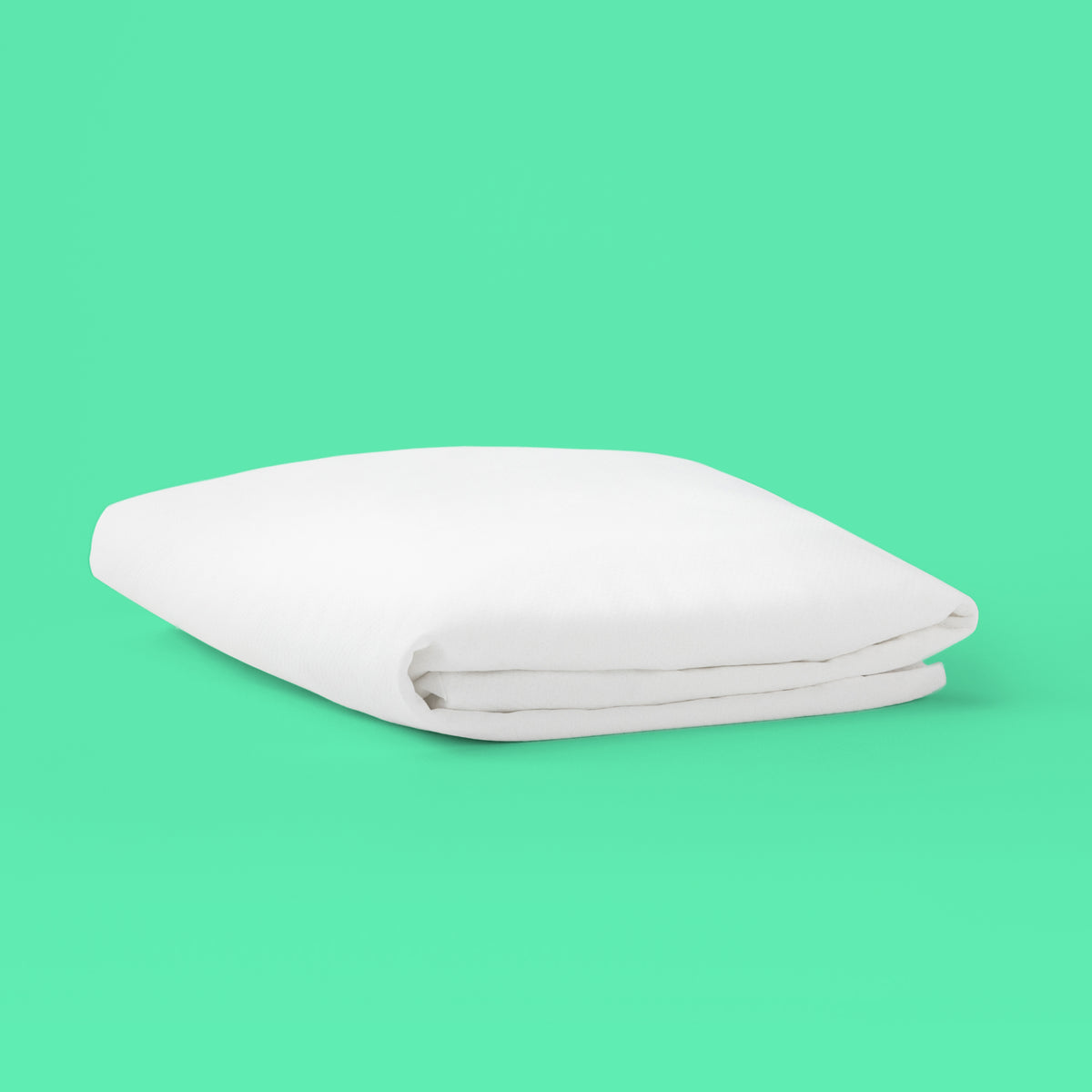 Tuft and needle mattress protector