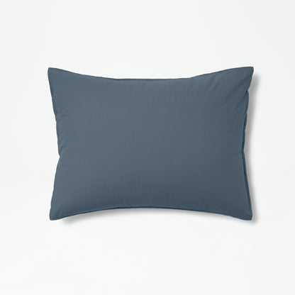 The Tuft and Needle Percale Duvet Cover Set on a pillow ||color:slate